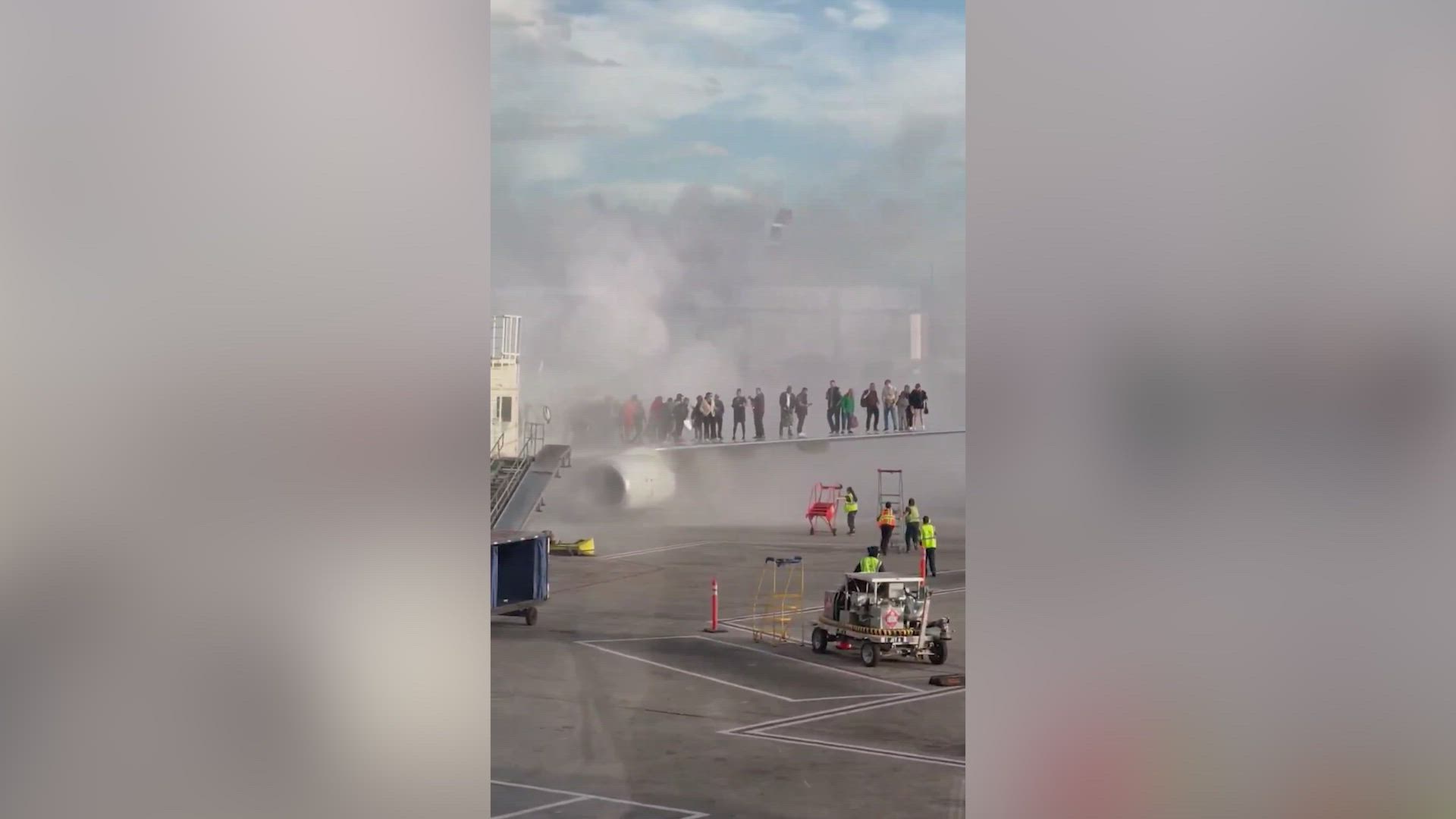 New footage revealed: passengers escape onto wing as American Airlines plane burns in Denver